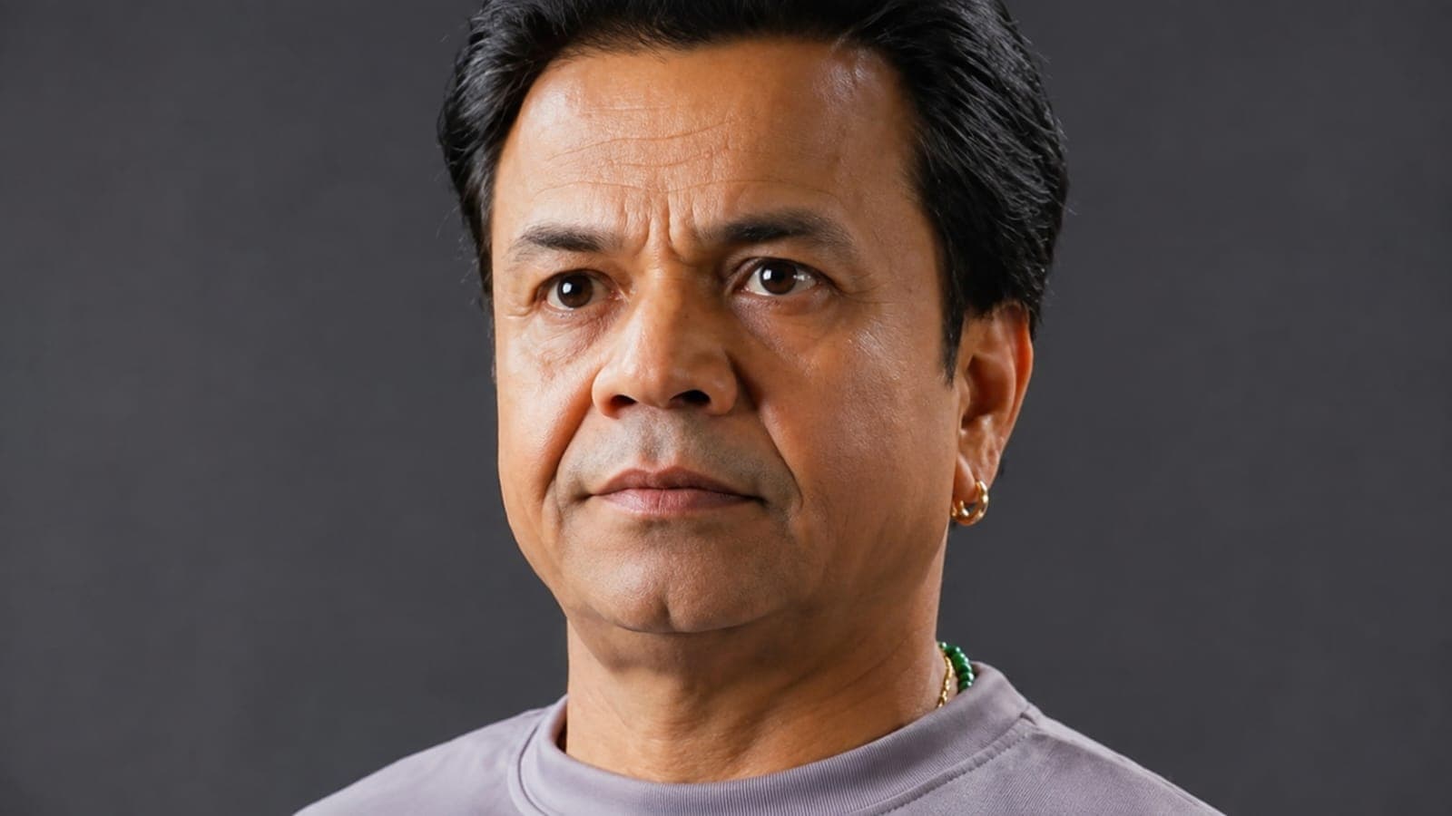 Actor Rajpal Yadav news article banner regarding property auction notice.