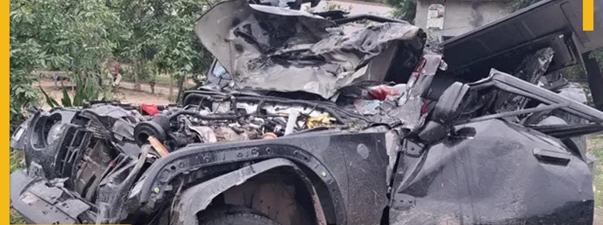 Hapur Ganga Expressway Thar accident scene with damaged vehicle on road